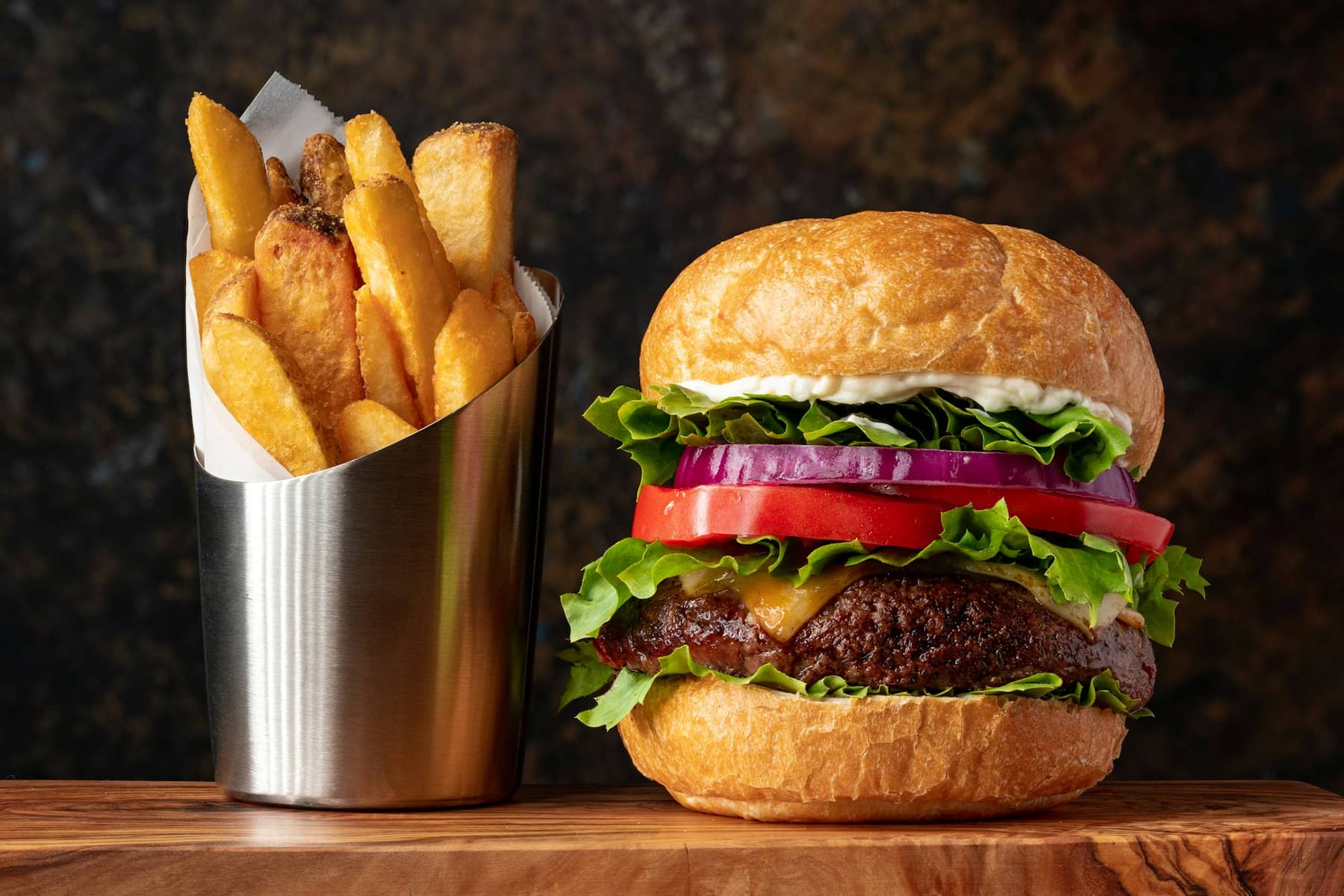 A burger and chips ready to go